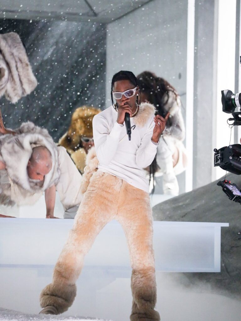 Man performing on stage and dancing