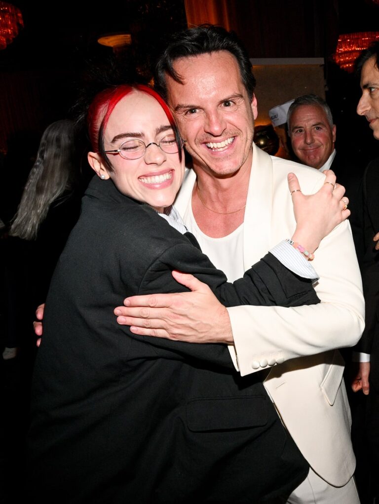 Billie Eilish posing and hugging man