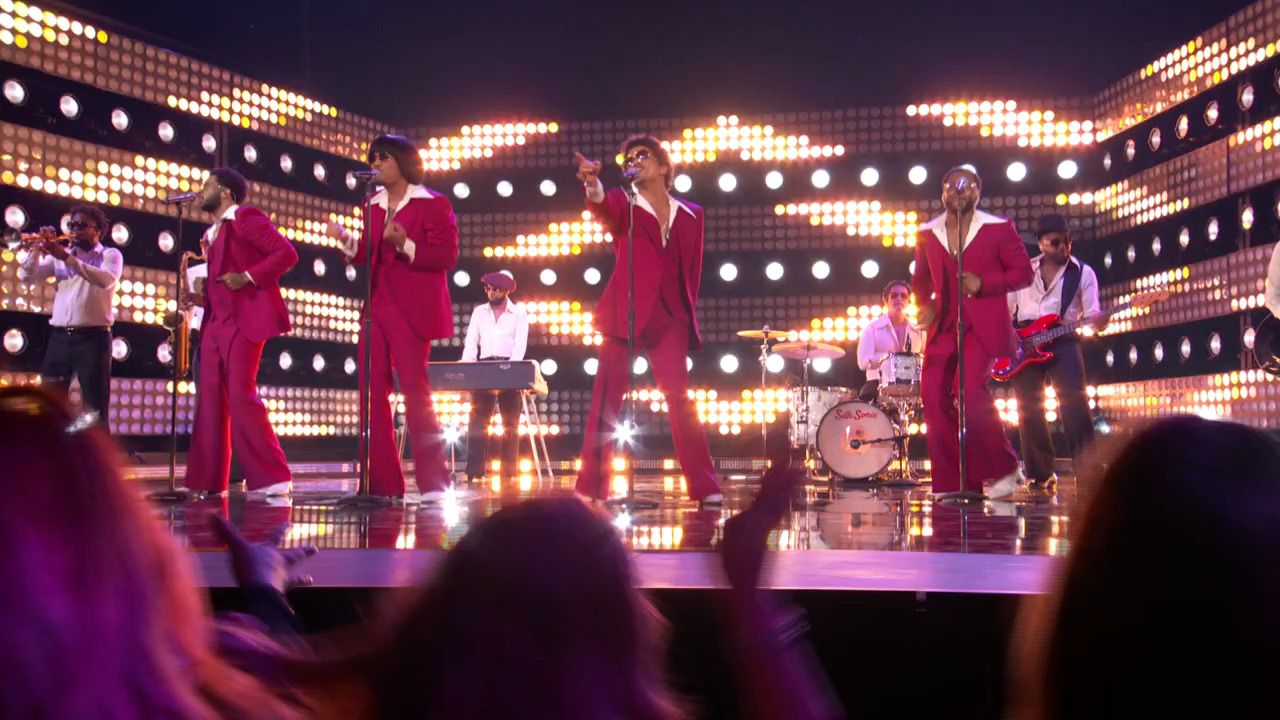 Silk Sonic performing on stage