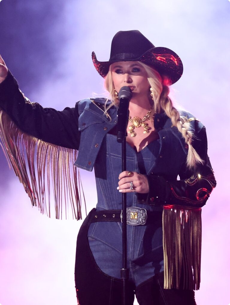 Woman singing into microphone