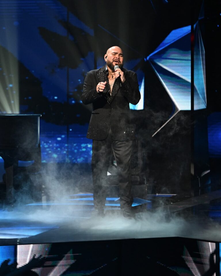 Man singing on stage