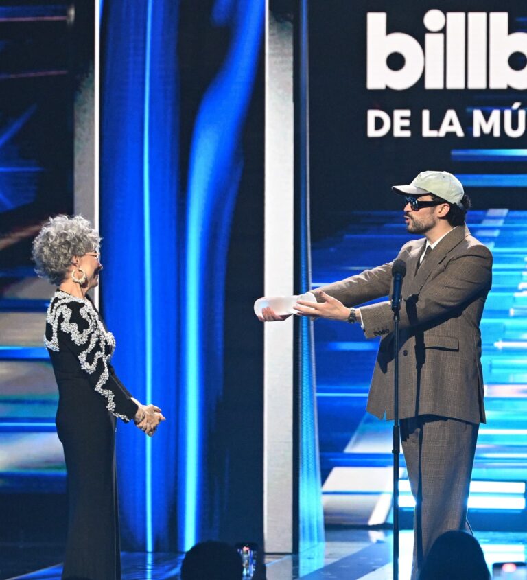 Man accepting award on stage